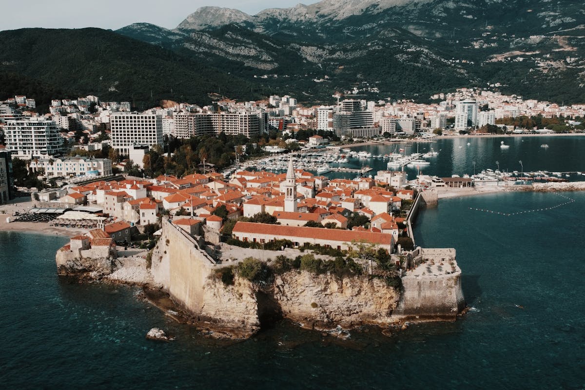 Budva nightlife along the waterfront promenade at night
