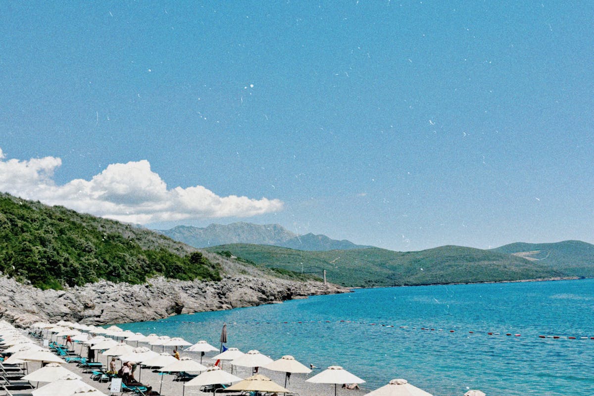 Aerial view of Bečići beach stretching along the Budva Riviera coastline